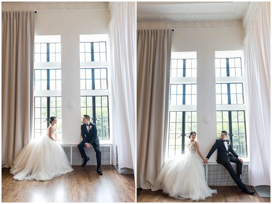 bride and groom portraits by large window at Alden Castle in Boston Longwood Wedding Venue