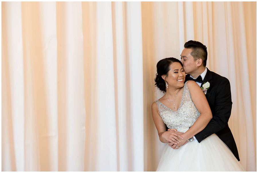 bride and groom kissing portraits  at Alden Castle in Boston Longwood Wedding Venue