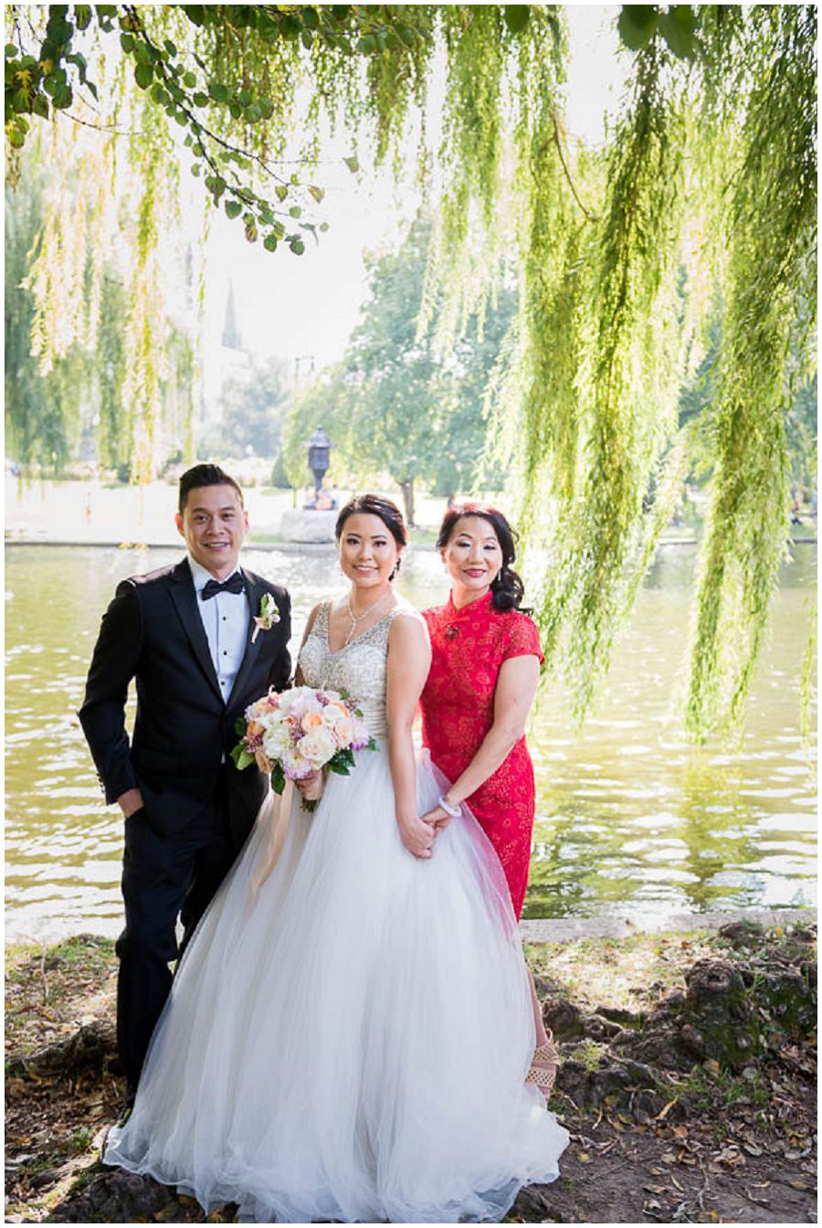 parents of the bride portraits during the afternoon in the summer at Boston Public Gardens by a tree