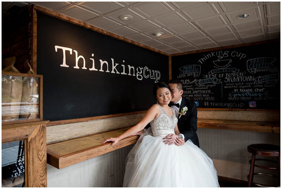 Couple portraits at Thinking Cup in Downtown Boston with sign of shop showing