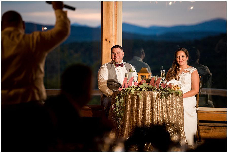 Toast by best man during reception at Granite Ridge Estate & Barn Wedding reaction of bride and groom