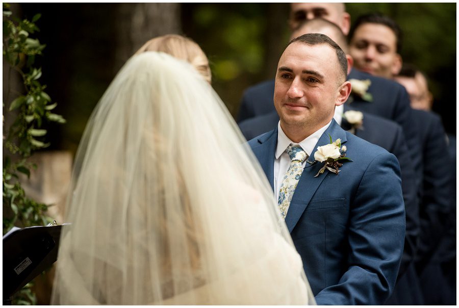 Groom looking at his bride.