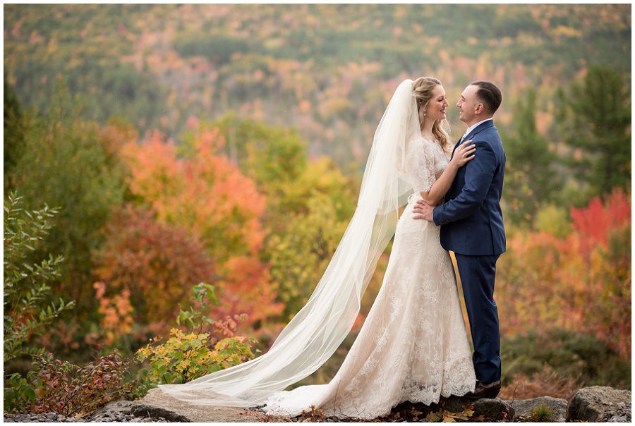 Couples portraits of the bride and groom with fall foliage at Granite Ridge Estate and Barn in Norway Maine
