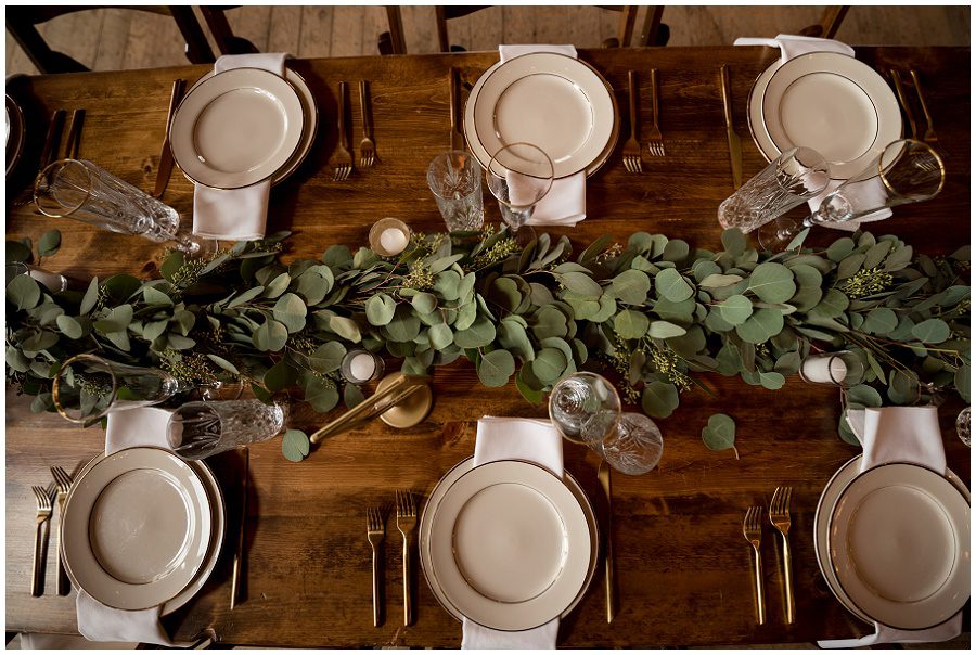 Tablescape with eucalyptus and classic stemware