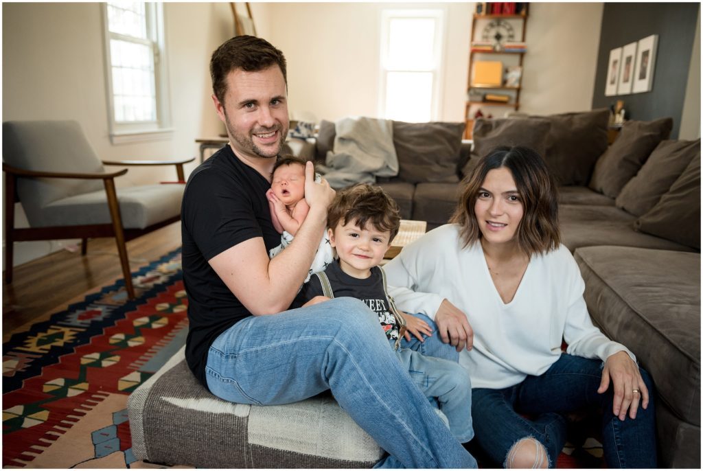 Family photo featuring newborn in lifestyle session at home