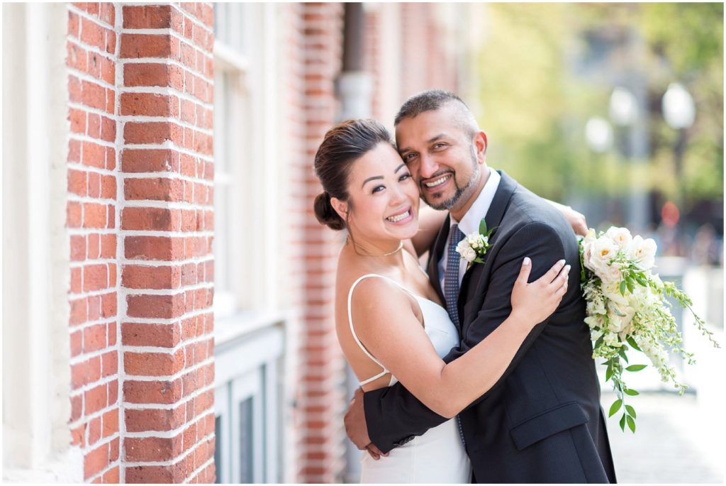 Bride and Groom after wedding civil ceremony posing outside Boston City Hall