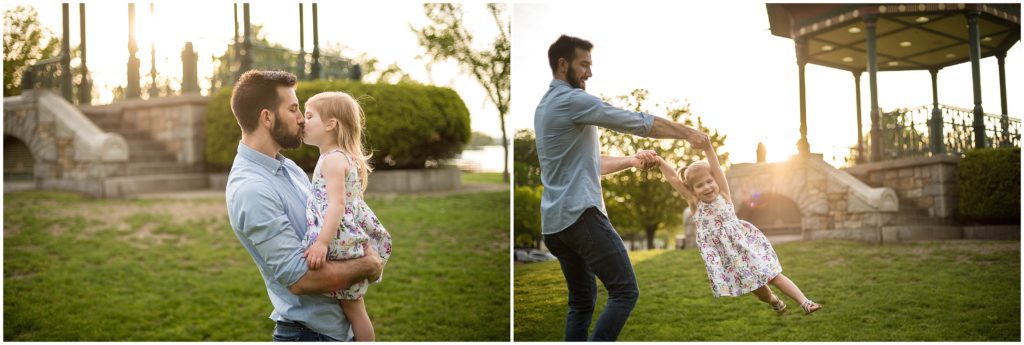 sunset father and daughter twirling during family session in Boston
