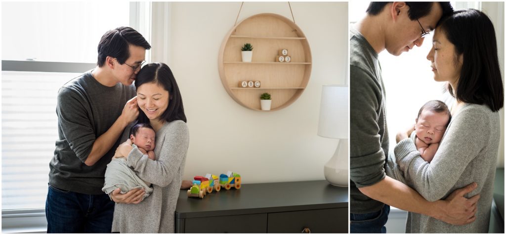 Parents holding newborn son