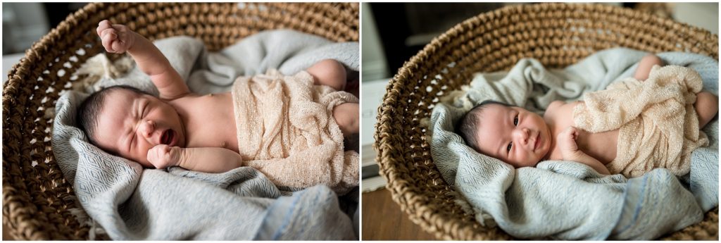 Newborn being held by parents in living room at home during lifestyle session in Cambridge