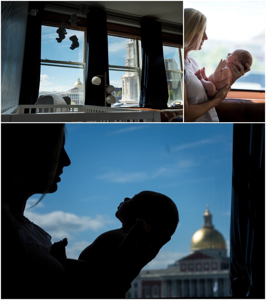 Mother holding newborn with state house in background