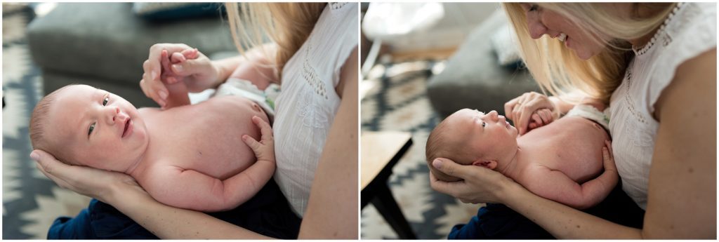 newborn held by mother