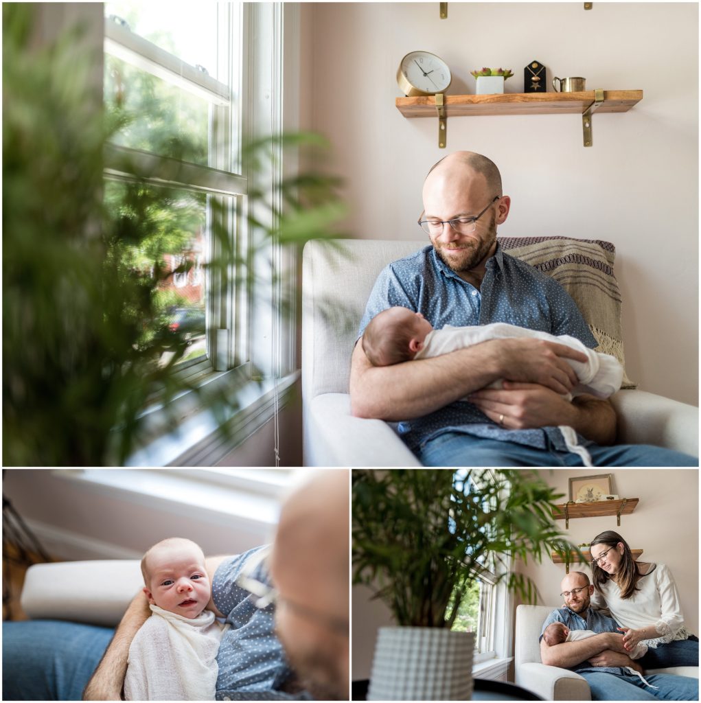 Dad holding daughter in nursery on rocking chair in Newton newborn session