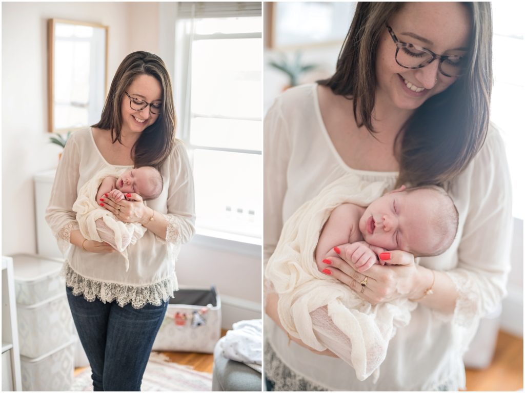 Mother holding newborn baby girl