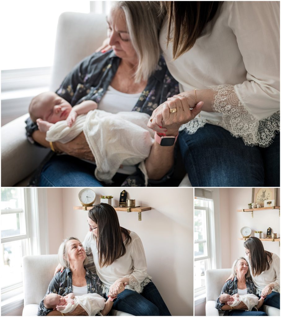 Grandmother holding grandchild and daughter