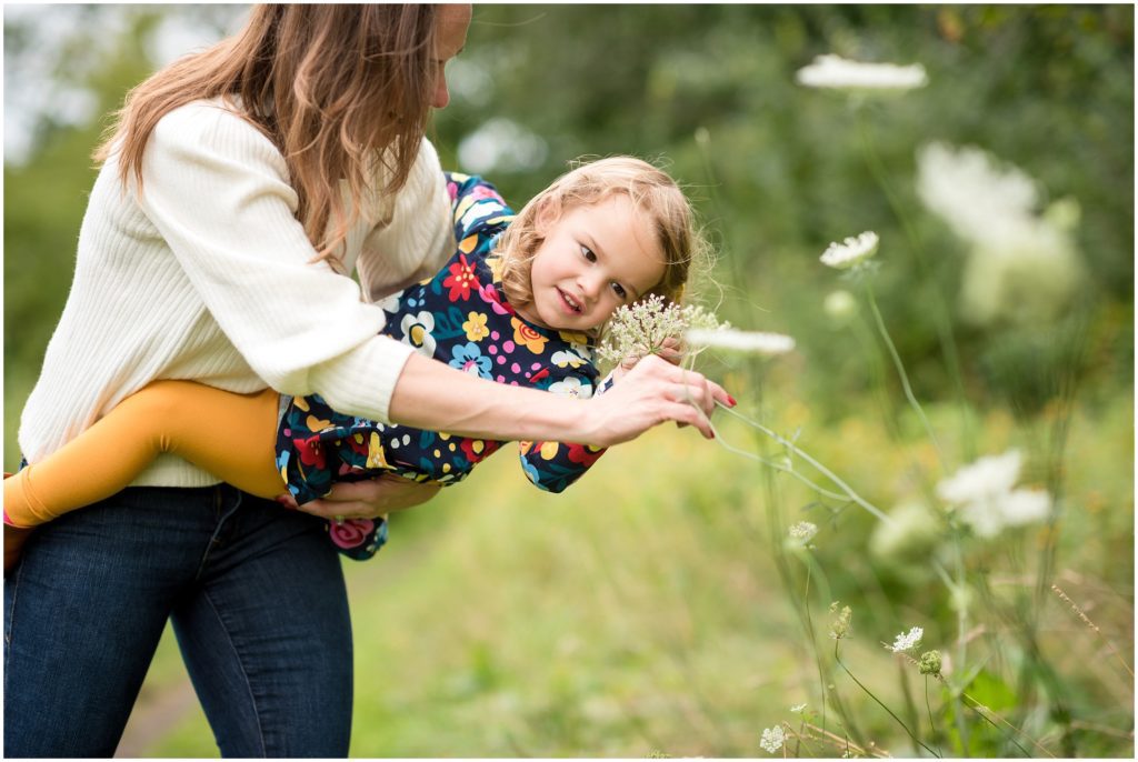 Daughter and mother looking at flowers in Belmont