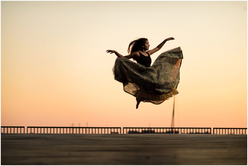Dancer taking to flight during jump. A sari to illustrate the movement I knew we would get from her dance-inspired senior session.