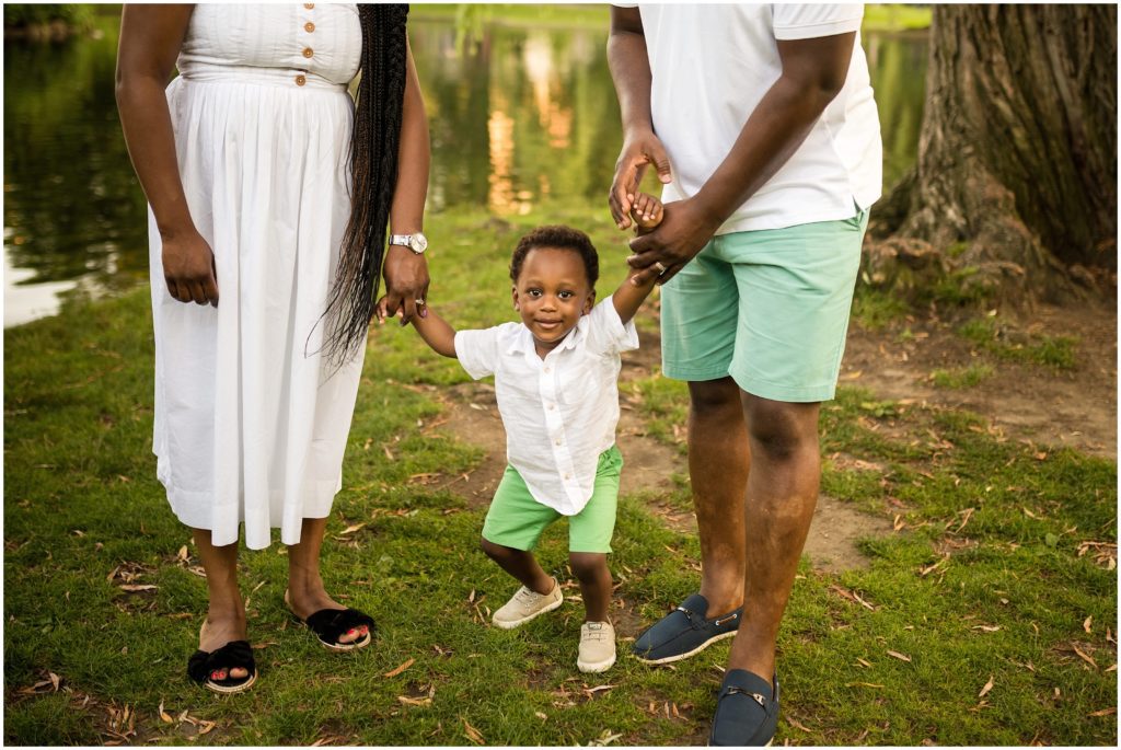 Family by pond at Boston Public Gardens