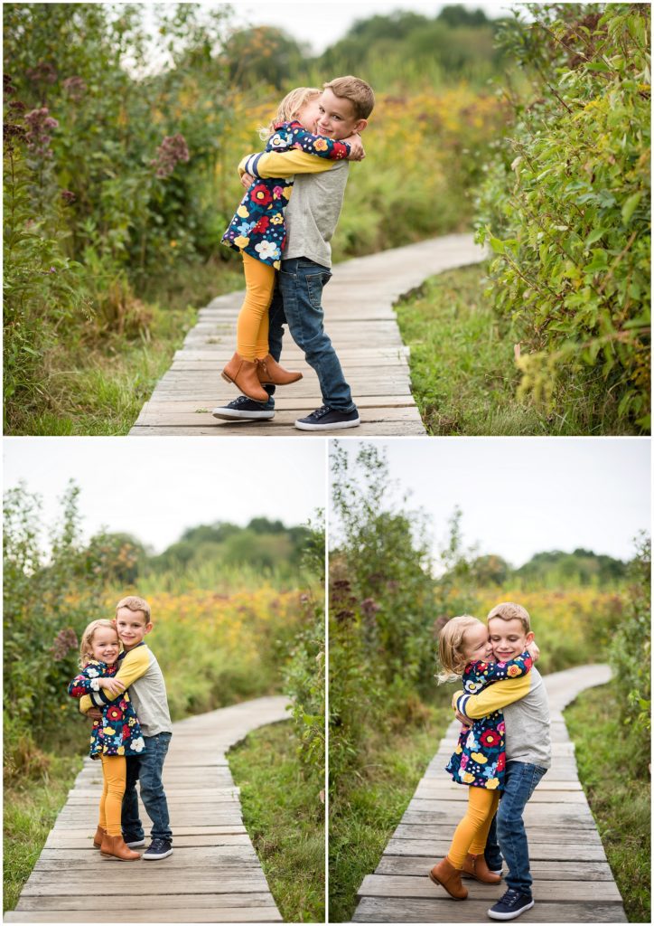 brother and sister playing in the park in fun outfits that are color coordinated