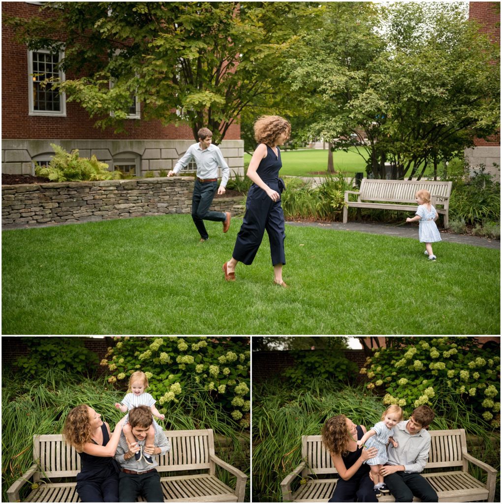 Parents playing with child in Harvard Yard