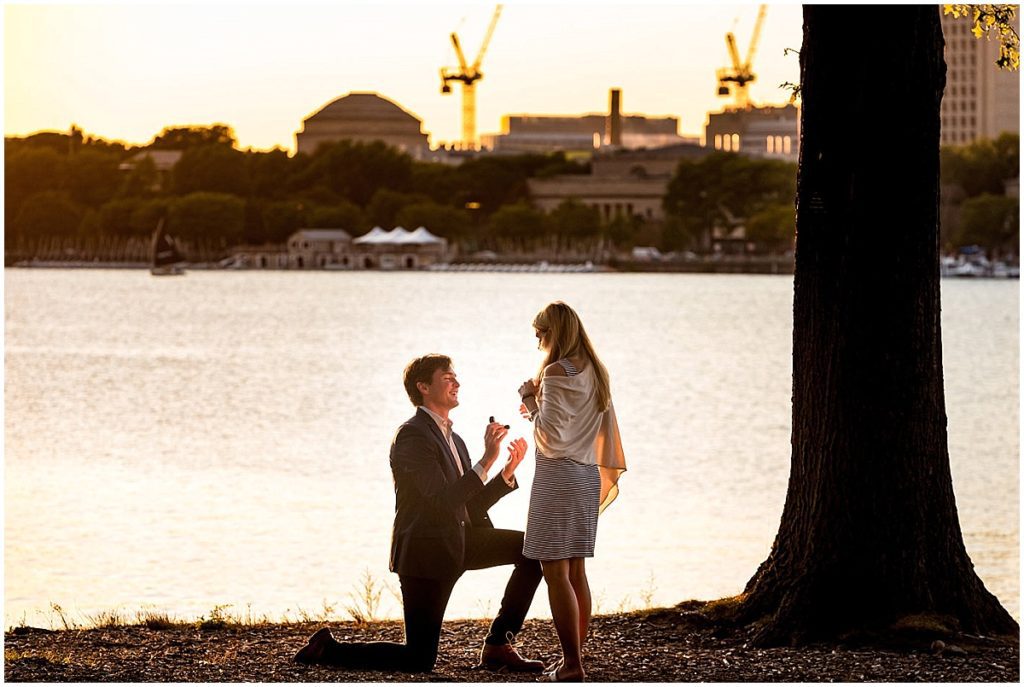He bent down on one knee to ask for her hand in marriage in this surprise sunset proposal in Boston