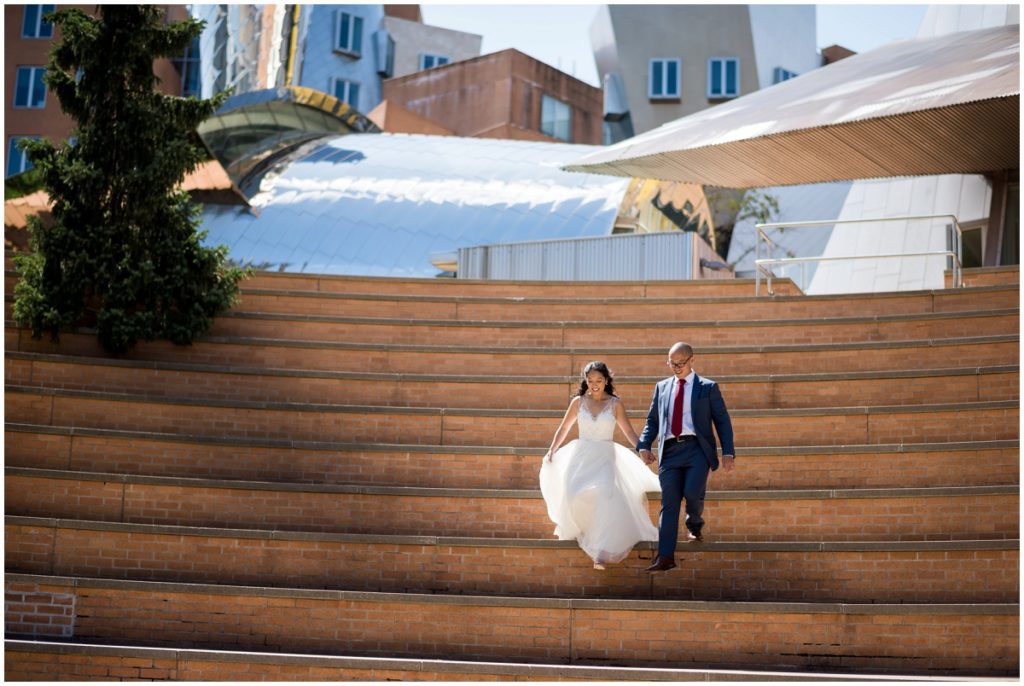 MIT wedding photos of bride and groom coming downstairs