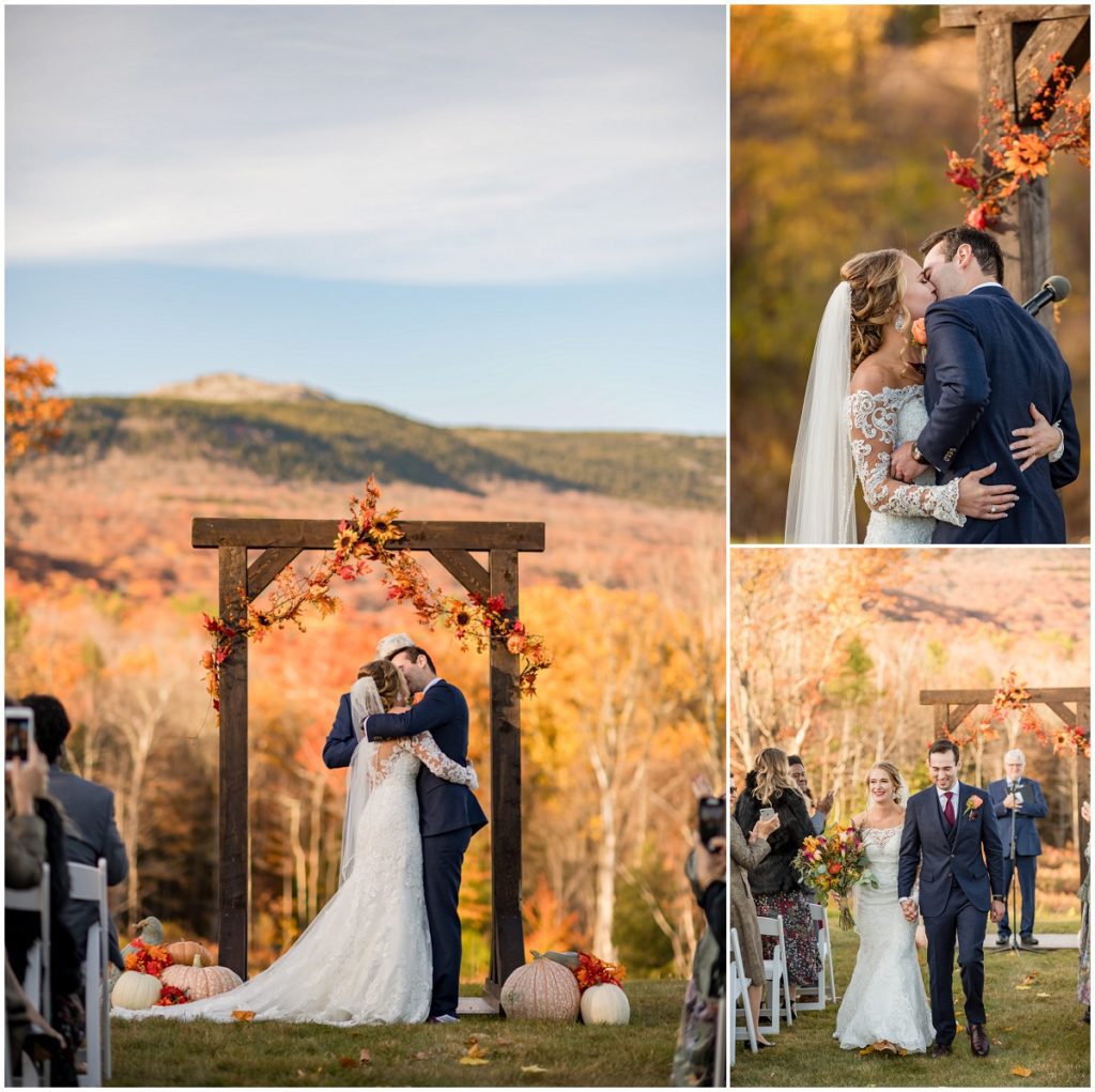 Bride and groom kissing at end of ceremony during NH barn outdoor wedding