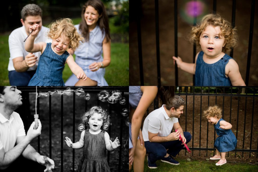 Child playing with bubbles in backyard