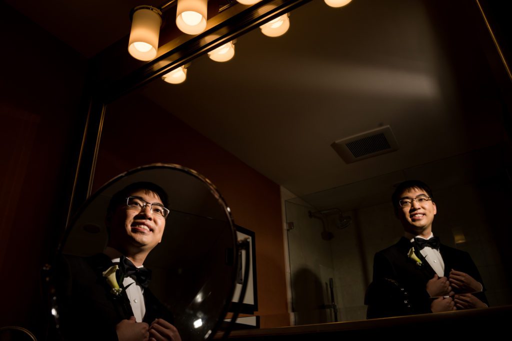 Groom prep getting ready in The Bostonian hotel Boston