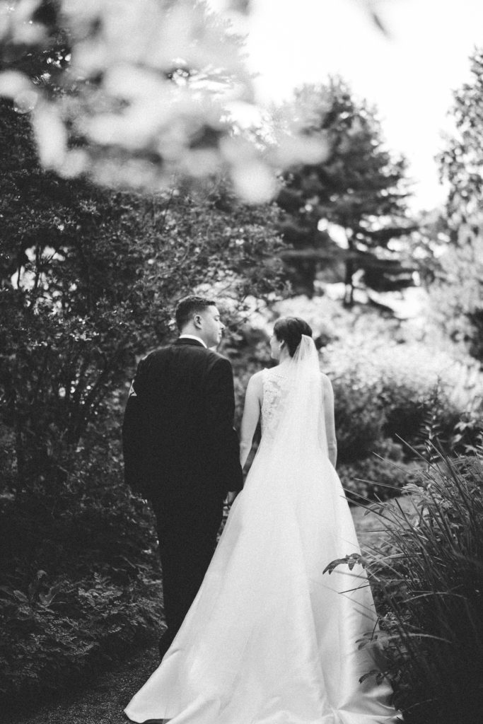 Couple portraits in the garden at the Estate at Moraine Farm