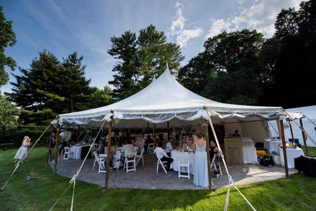 Guests entering the tent at wedding