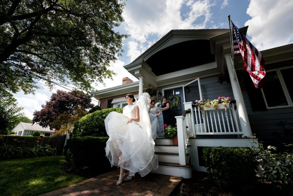 bride exiting her house