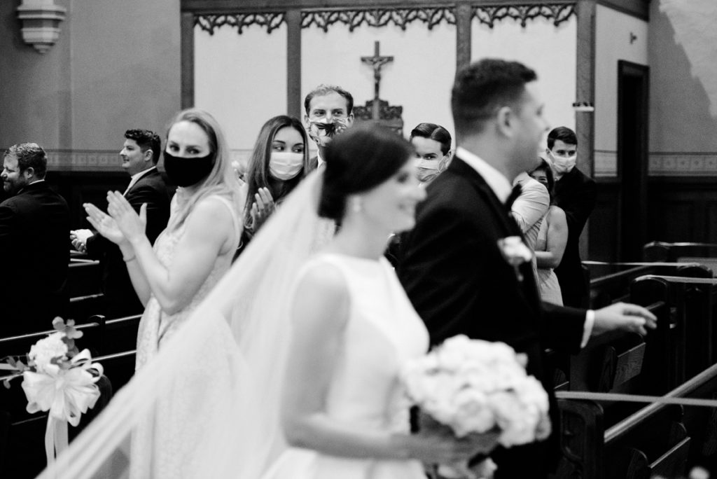 Bride and Groom exiting the church after the wedding