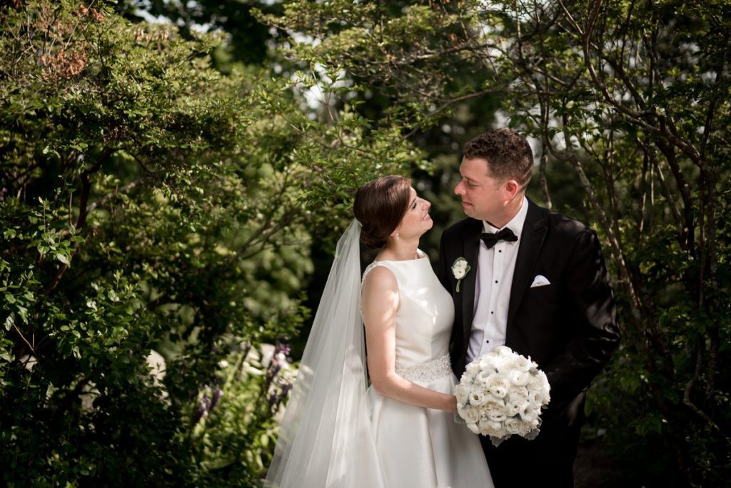 Couple portraits in the garden at the Estate at Moraine Farm