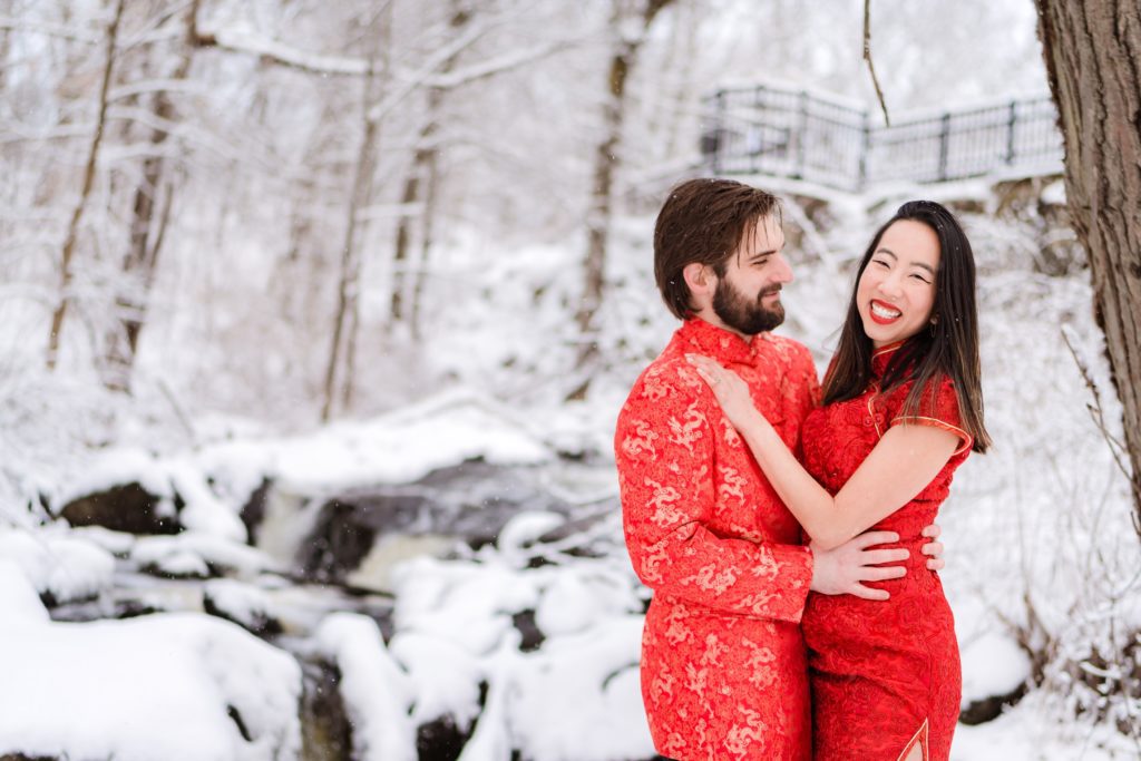 Couple wearing traditional Chinese outfits in their engagement session