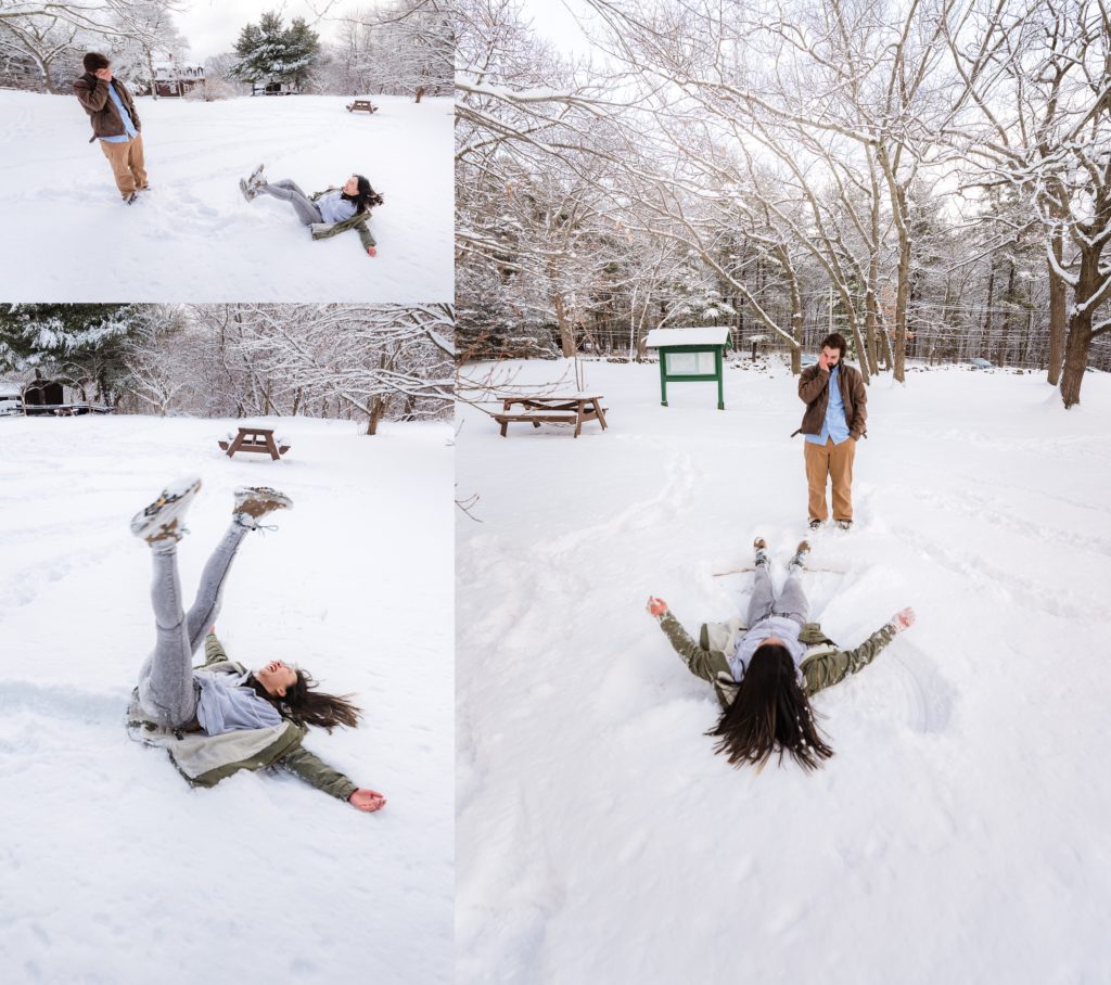 girl falls down in snow