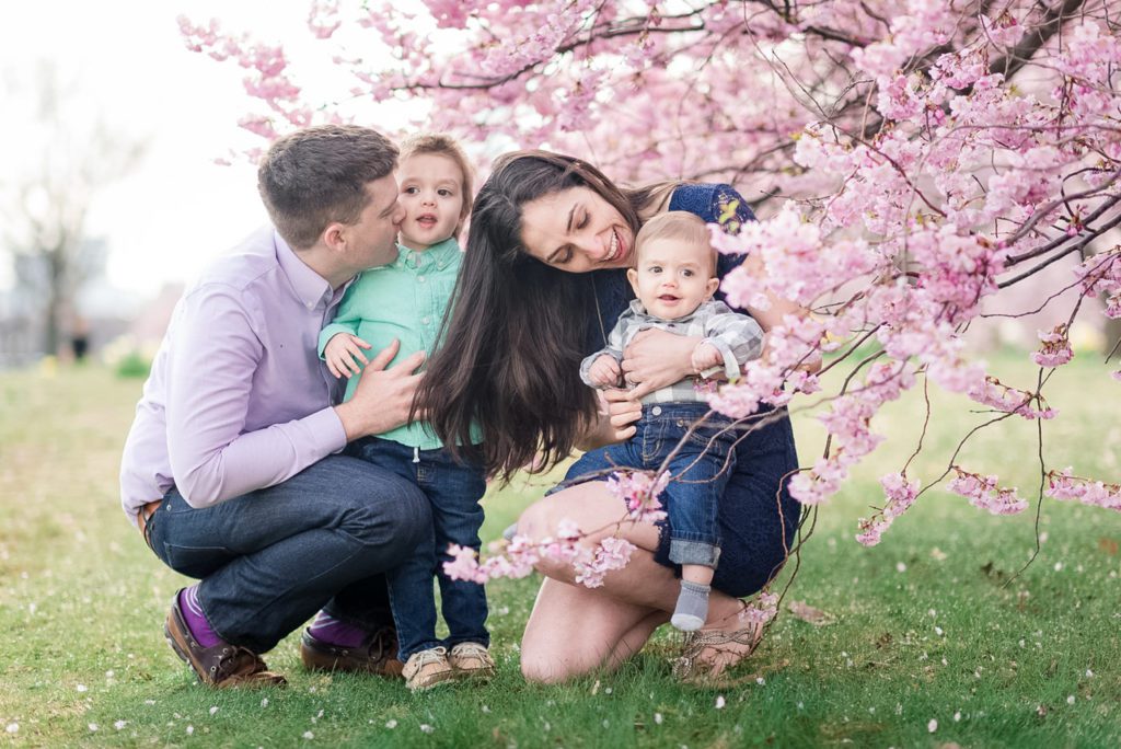 bold outfit colours for an outdoor spring photo session with cherry blossoms in Boston