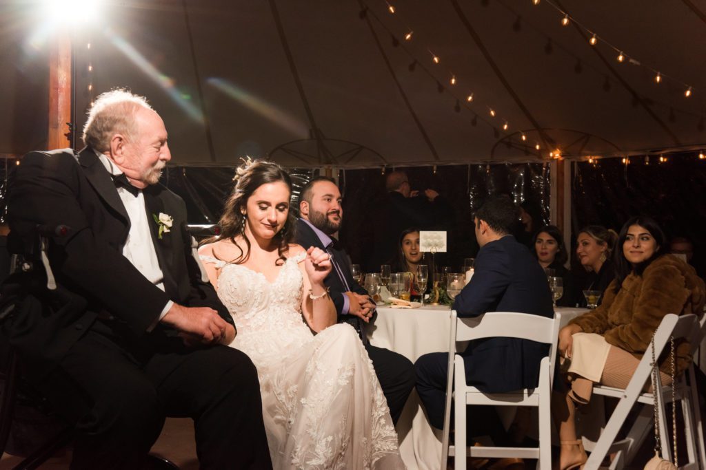 Father and daughter listening to their song