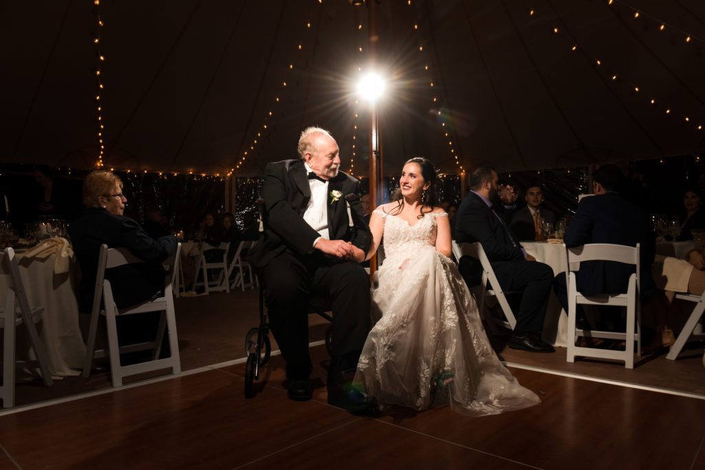 Father and daughter listening to their song