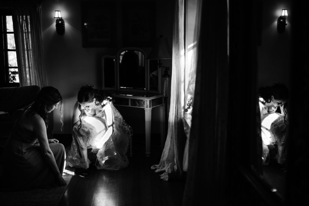 Bridal prep in black in white photo